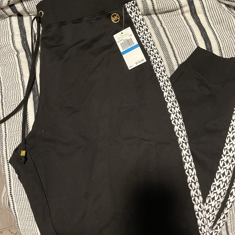 Size Xl Michael Kors black joggers. New with tags on them. Never worn